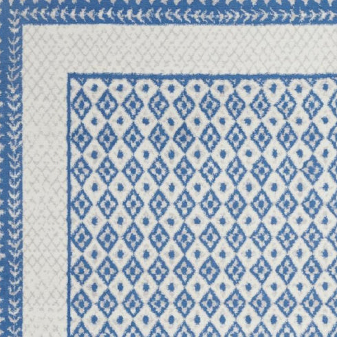 Ivory and Blue Geometric Area Rug